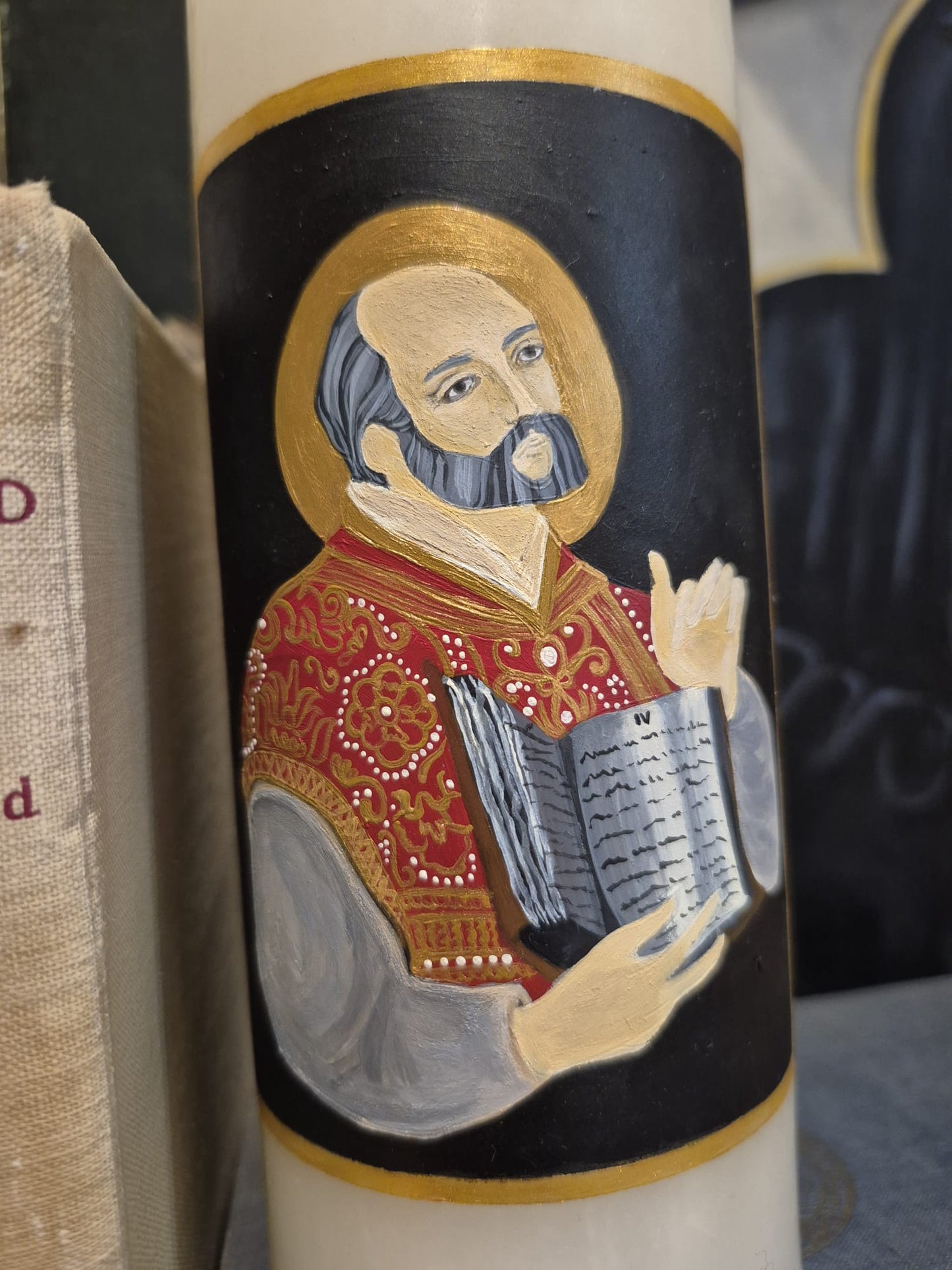Hand-painted candle of St Ignatius of Loyola